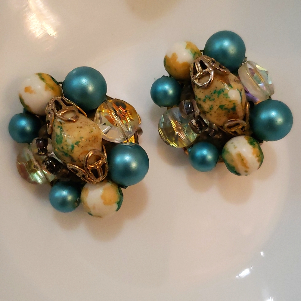 Vintage 1960s clip-on earrings in a cluster design.